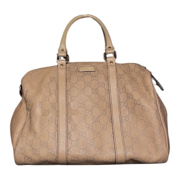 Gucci Guccissima embossed leather Boston bag crafted in beige - Picture 1 of 8